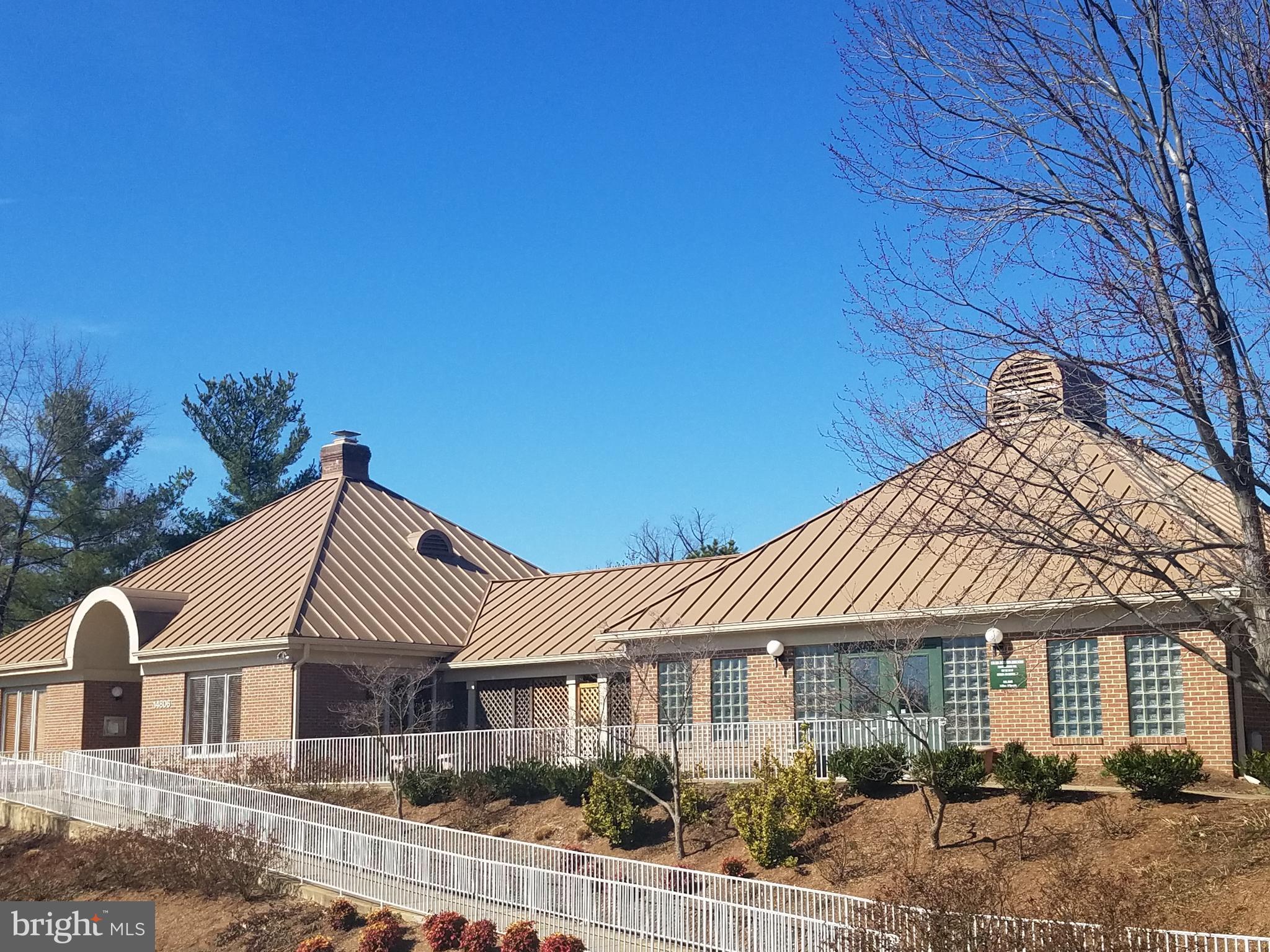 14802 Rydell Road, Unit 202 Centreville, VA 20121 - Photo 24 of 27 front view of a house with a yard