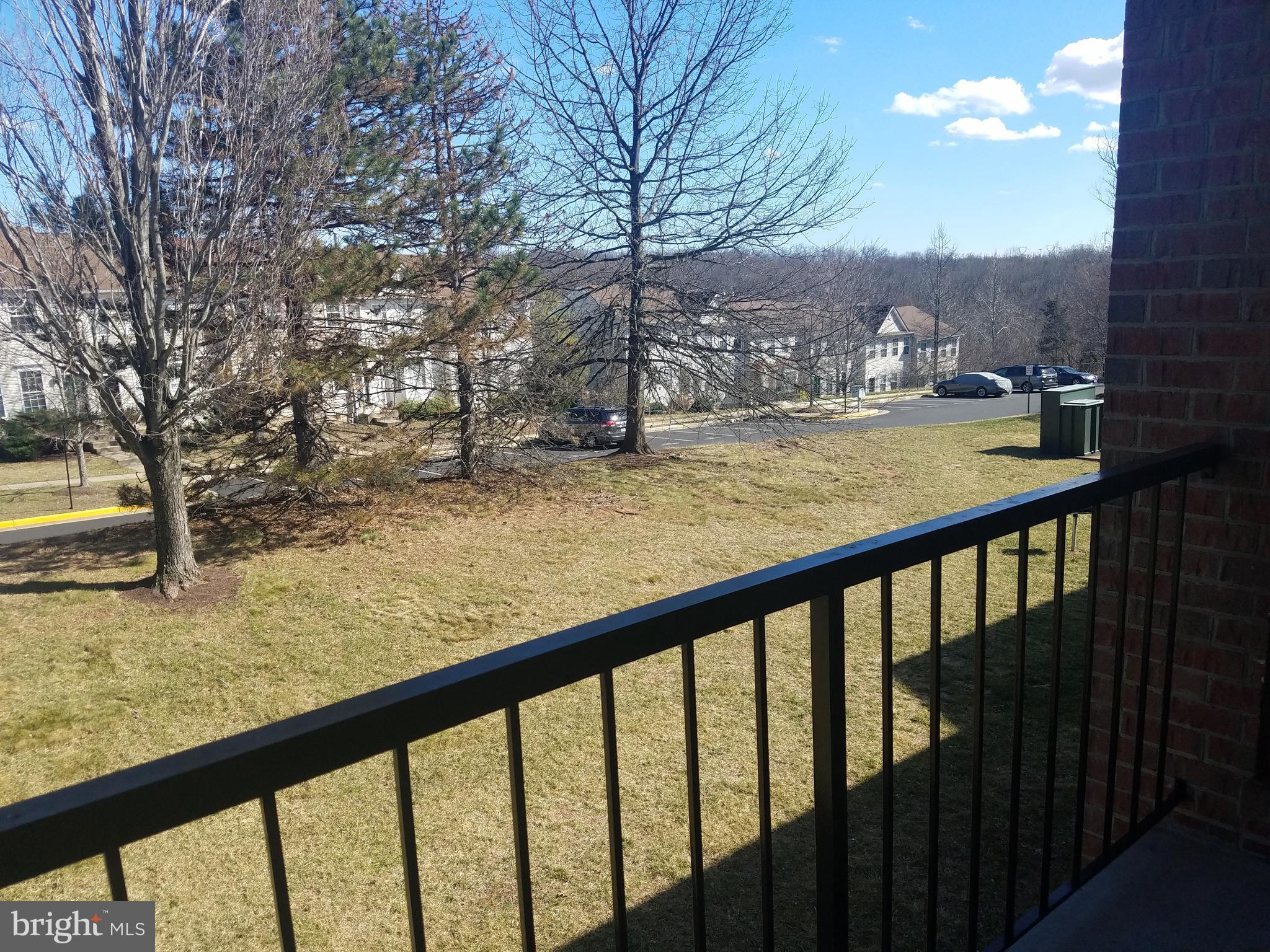 14802 Rydell Road, Unit 202 Centreville, VA 20121 - Photo 8 of 27 a view of city from a balcony