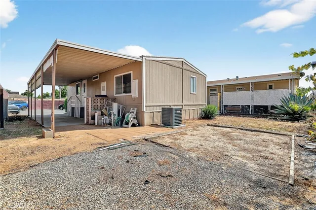 a house view with outdoor seating space