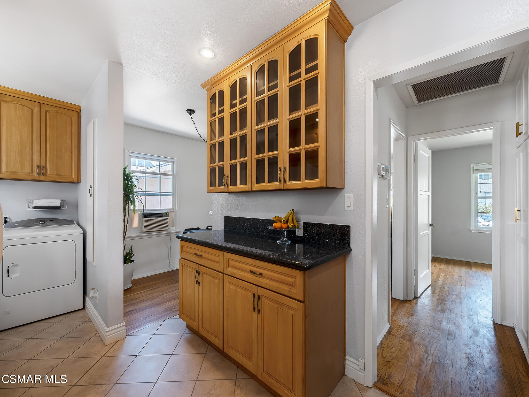 7247 Yolanda Avenue Reseda, CA 91335 - Photo 15 of 33 a kitchen with a cabinets and wooden floor