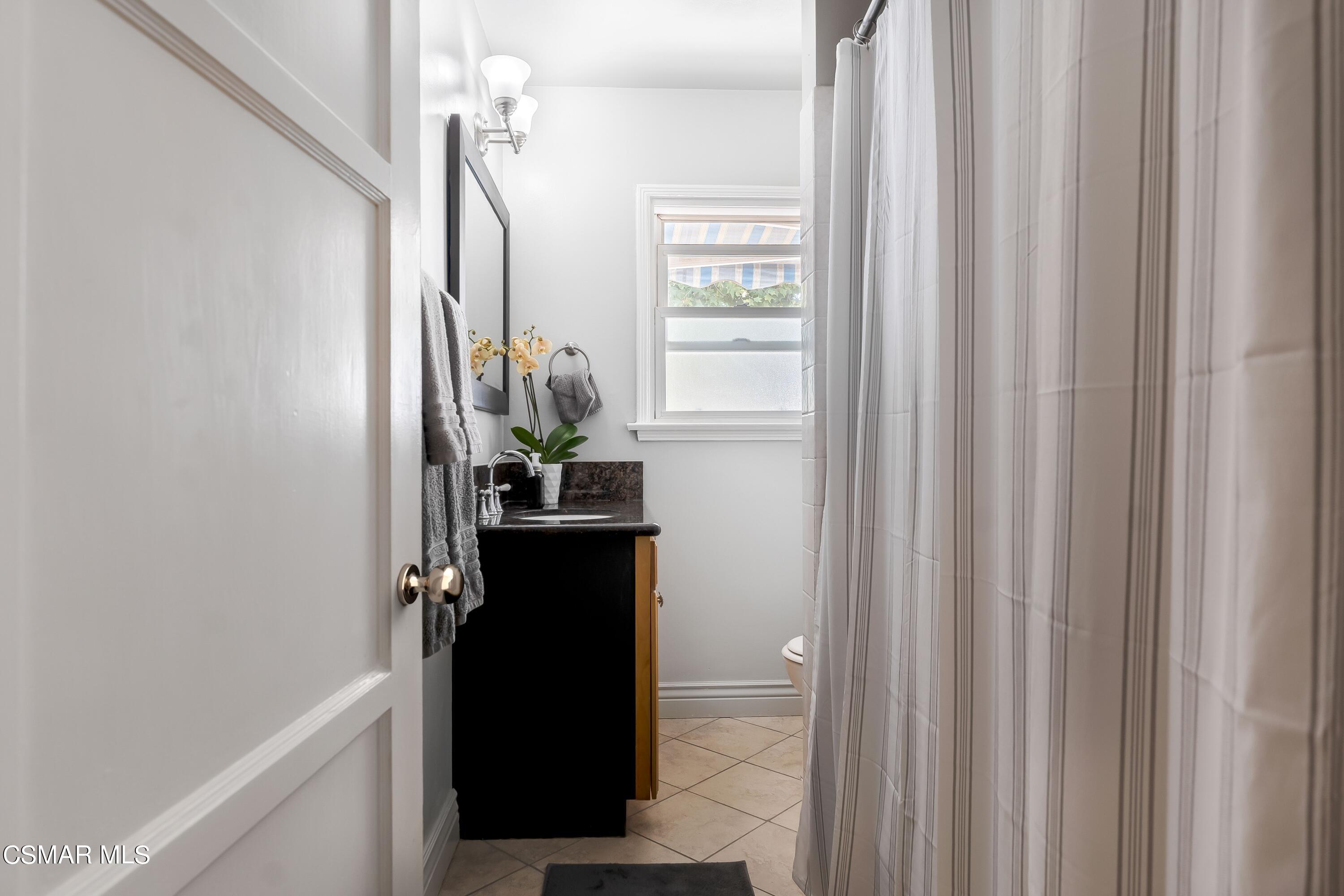 7247 Yolanda Avenue Reseda, CA 91335 - Photo 17 of 33 a view of hallway with wooden floor