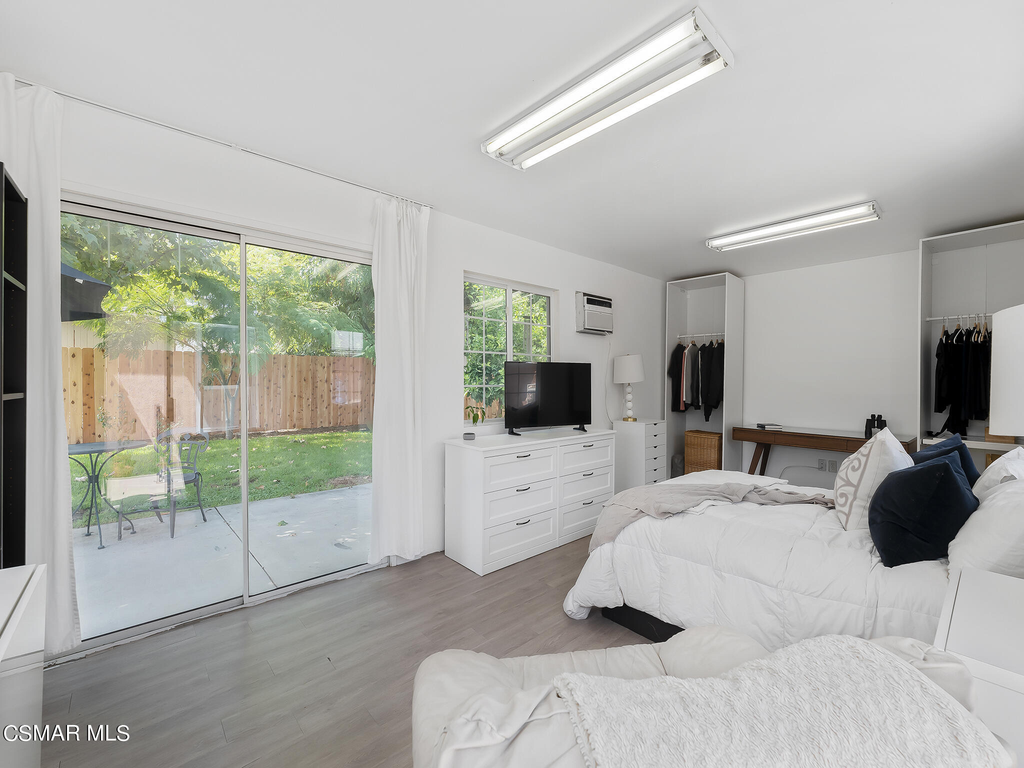 7247 Yolanda Avenue Reseda, CA 91335 - Photo 19 of 33 a bedroom with a bed and a flat screen tv