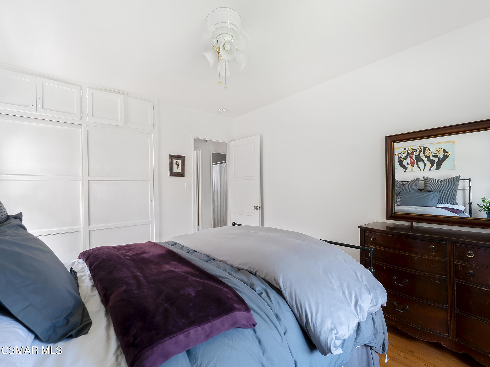 7247 Yolanda Avenue Reseda, CA 91335 - Photo 21 of 33 a bedroom with a bed and a dresser