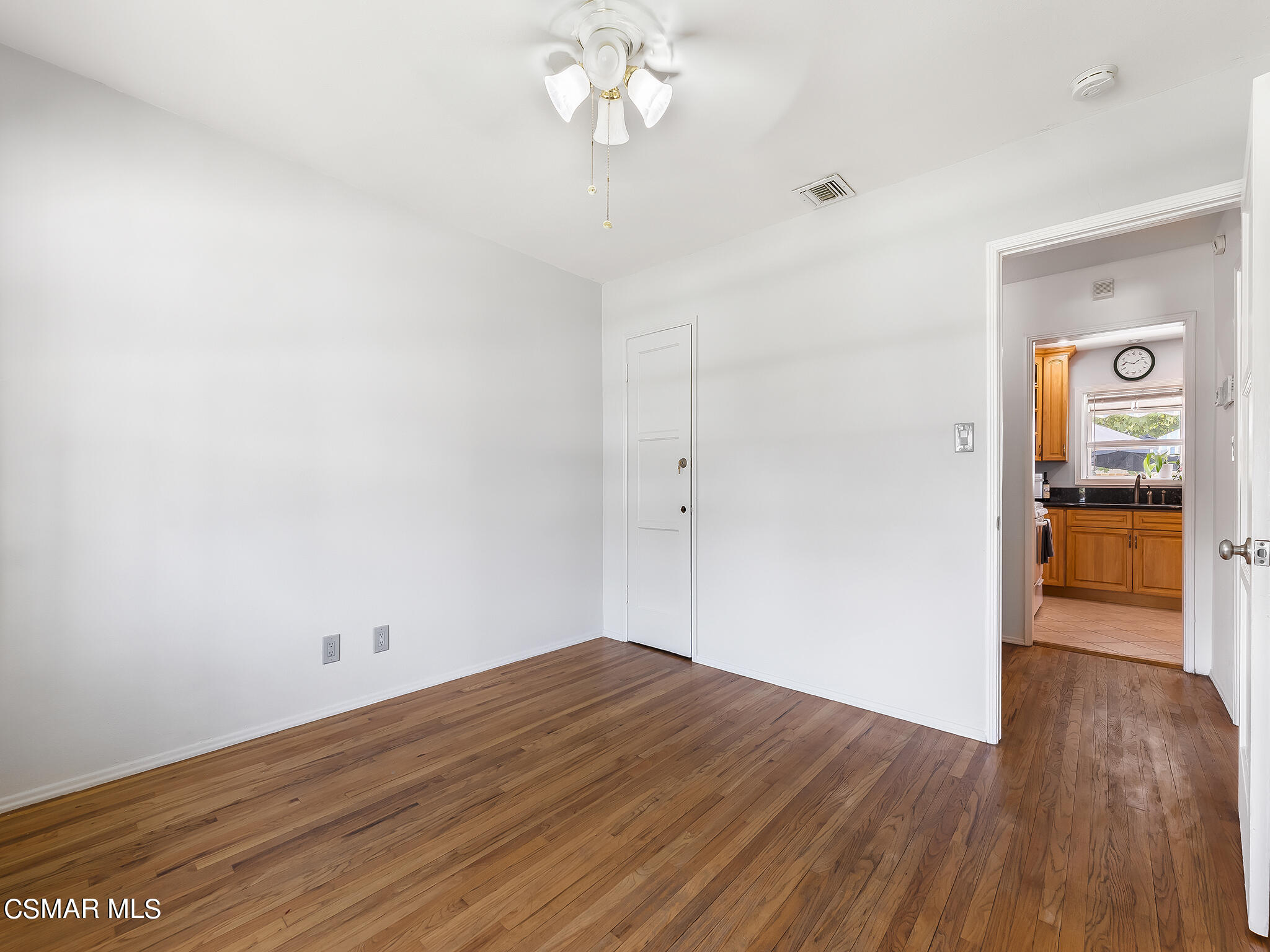 7247 Yolanda Avenue Reseda, CA 91335 - Photo 23 of 33 a view of a hallway with wooden floor