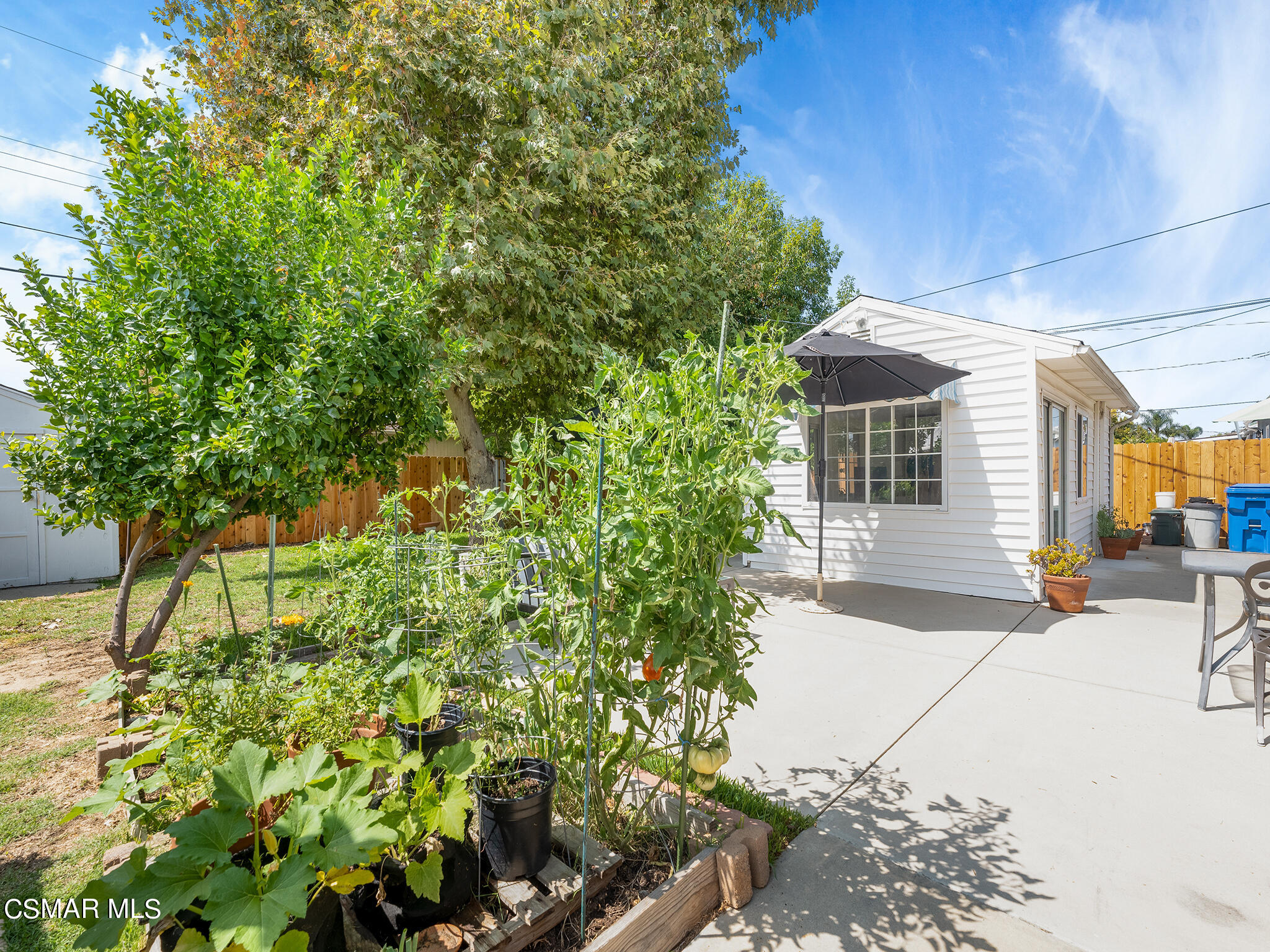 7247 Yolanda Avenue Reseda, CA 91335 - Photo 28 of 33 a pathway of a house with a yard