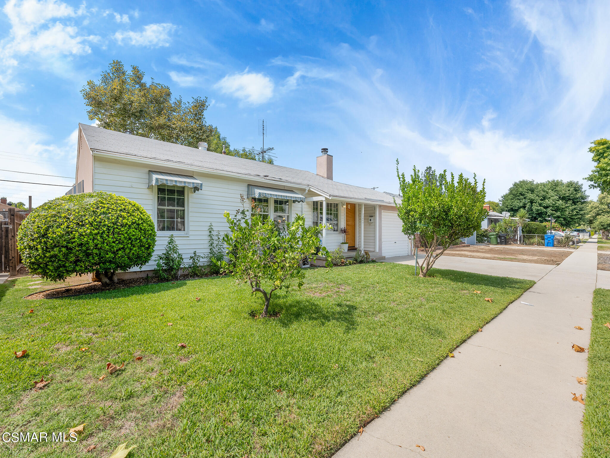 7247 Yolanda Avenue Reseda, CA 91335 - Photo 31 of 33 a view of a house with a yard and plants