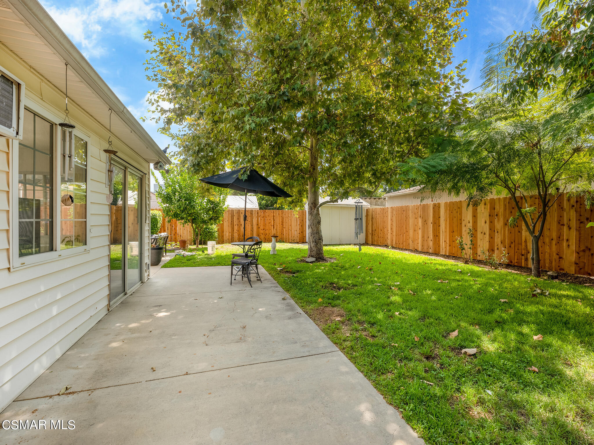 7247 Yolanda Avenue Reseda, CA 91335 - Photo 7 of 33 a view of a house with backyard and a garden