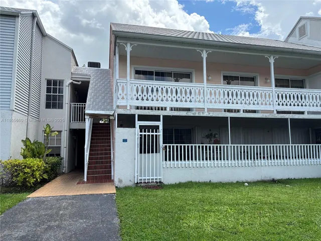 a front view of a house with entryway