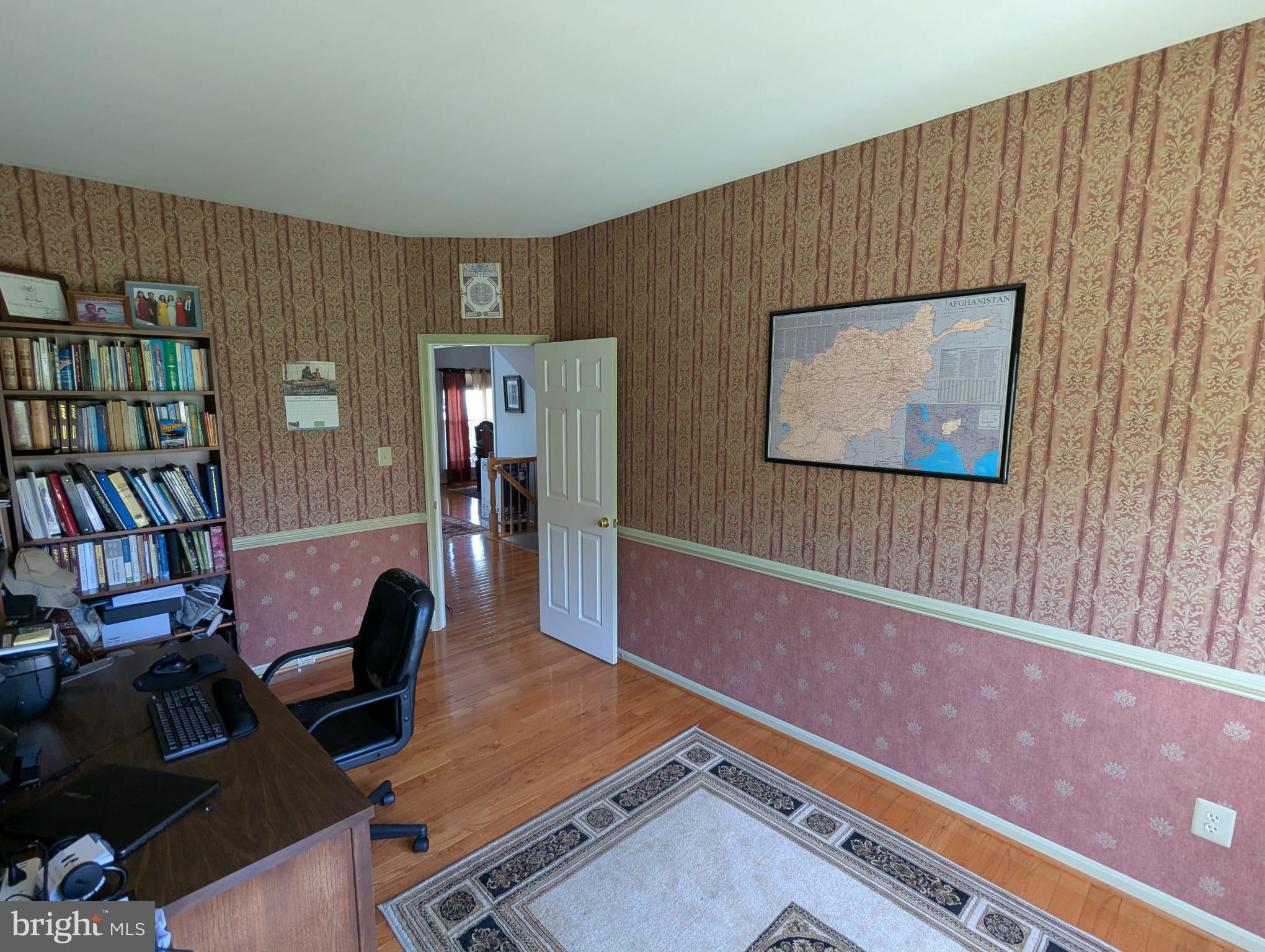 9871 Upper Mill Loop Bristow, VA 20136 - Photo 20 of 84 Main Level Library. Potential 6thy Bedroom
