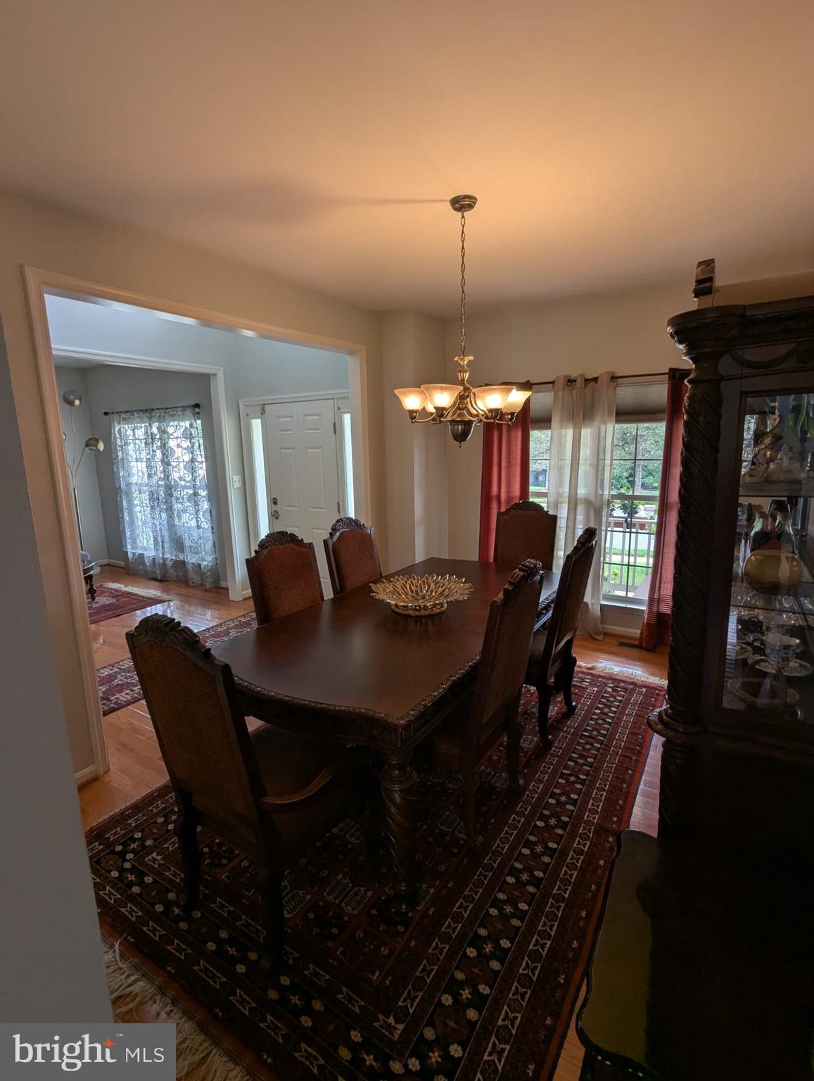 9871 Upper Mill Loop Bristow, VA 20136 - Photo 7 of 84 a dining room with furniture and wooden floor