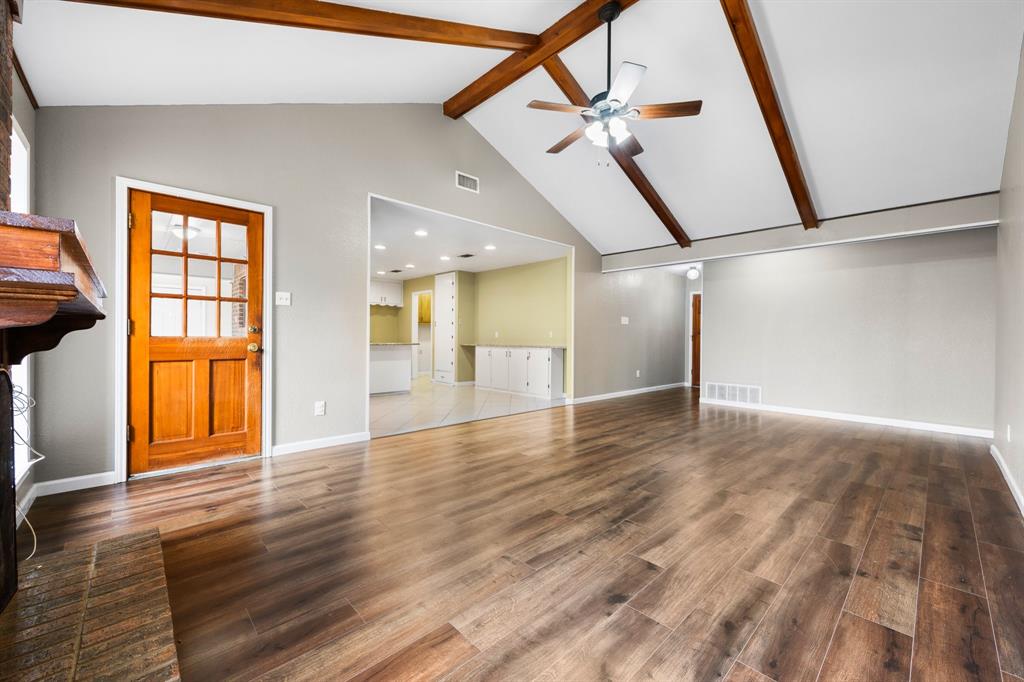 1102 Lena Street Cleburne, TX 76033 - Photo 7 of 36 a view of an entryway with wooden floor