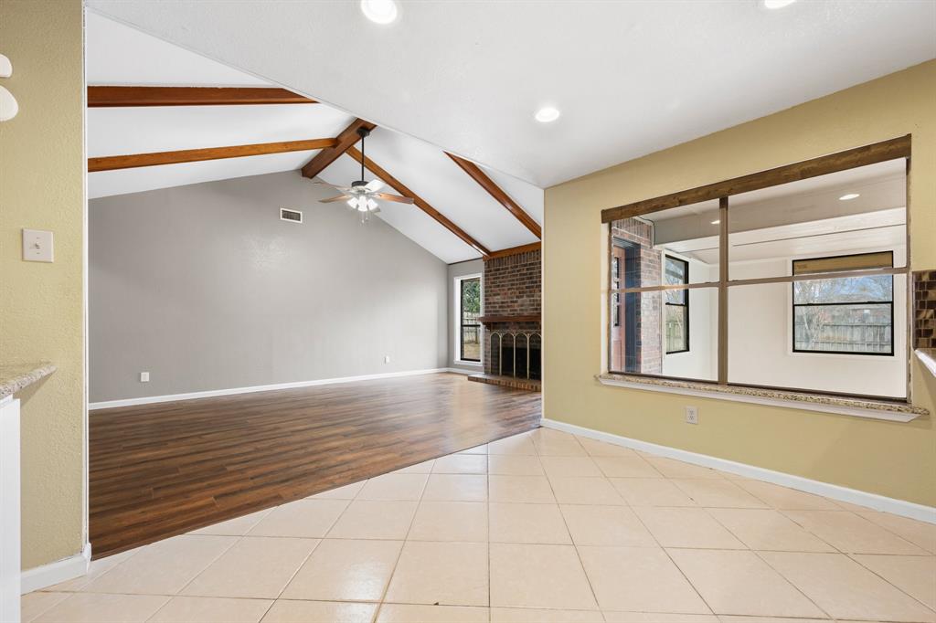 1102 Lena Street Cleburne, TX 76033 - Photo 10 of 36 a view of an empty room with glass door