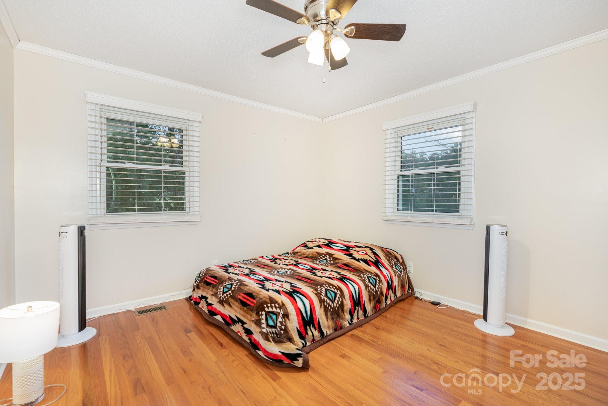 512 Ralphs Boulevard Gastonia, NC 28052 - Photo 15 of 32 a bedroom with a bed and window