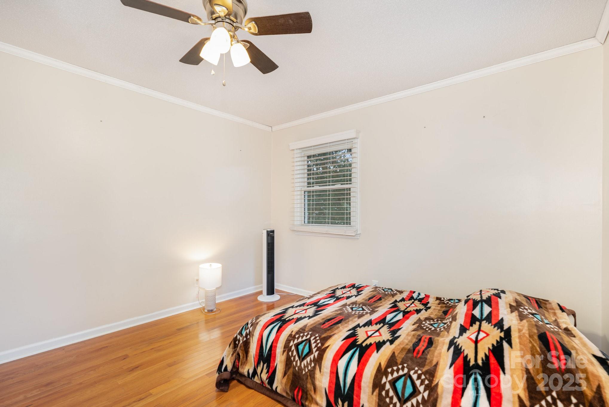 512 Ralphs Boulevard Gastonia, NC 28052 - Photo 17 of 32 a bedroom with a bed and a window