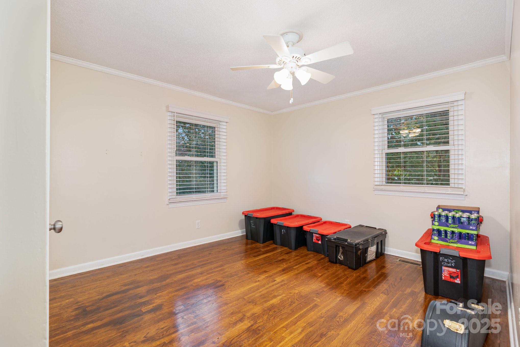 512 Ralphs Boulevard Gastonia, NC 28052 - Photo 20 of 32 a living room with furniture and a wooden floor