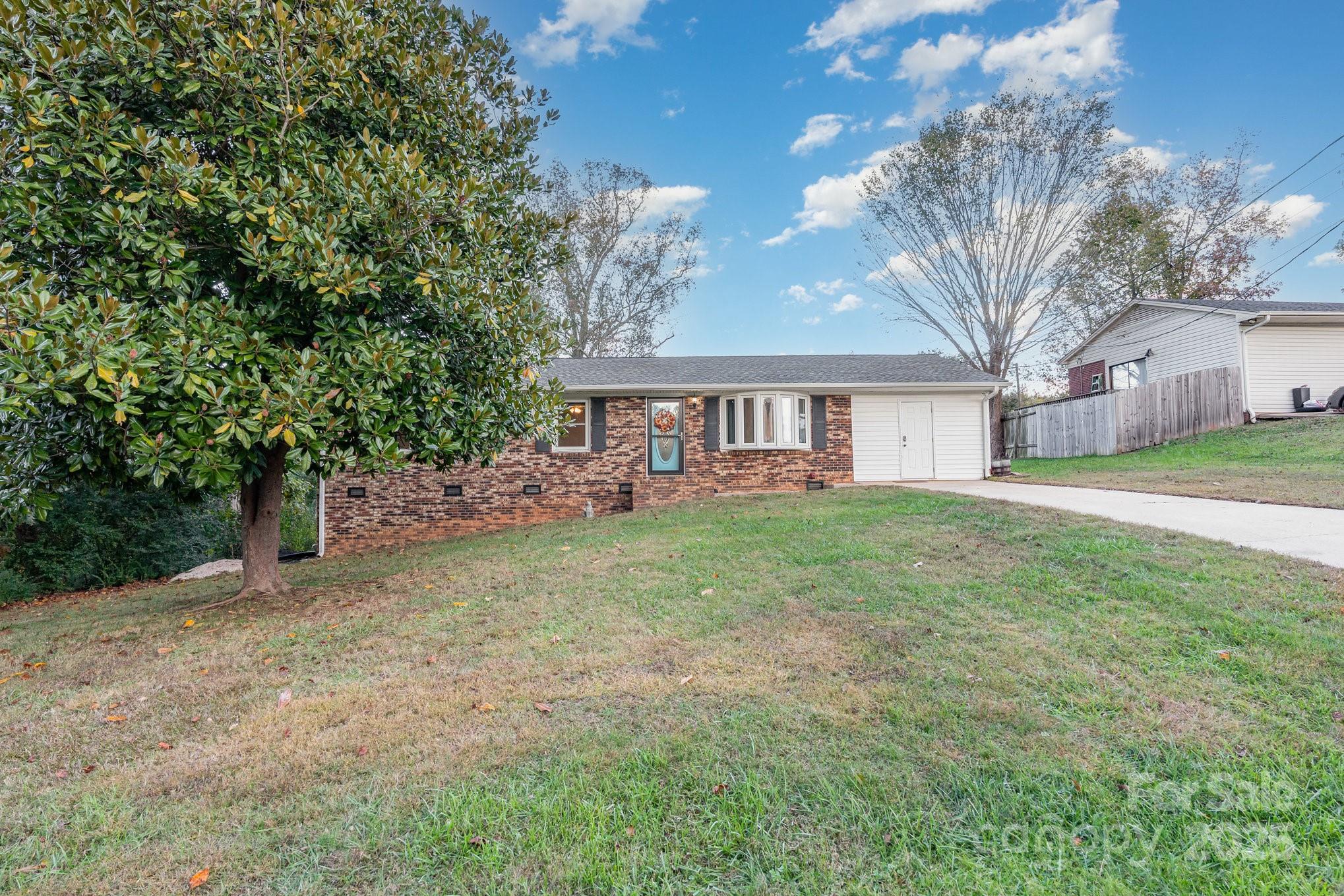 512 Ralphs Boulevard Gastonia, NC 28052 - Photo 2 of 32 a view of a house with a yard