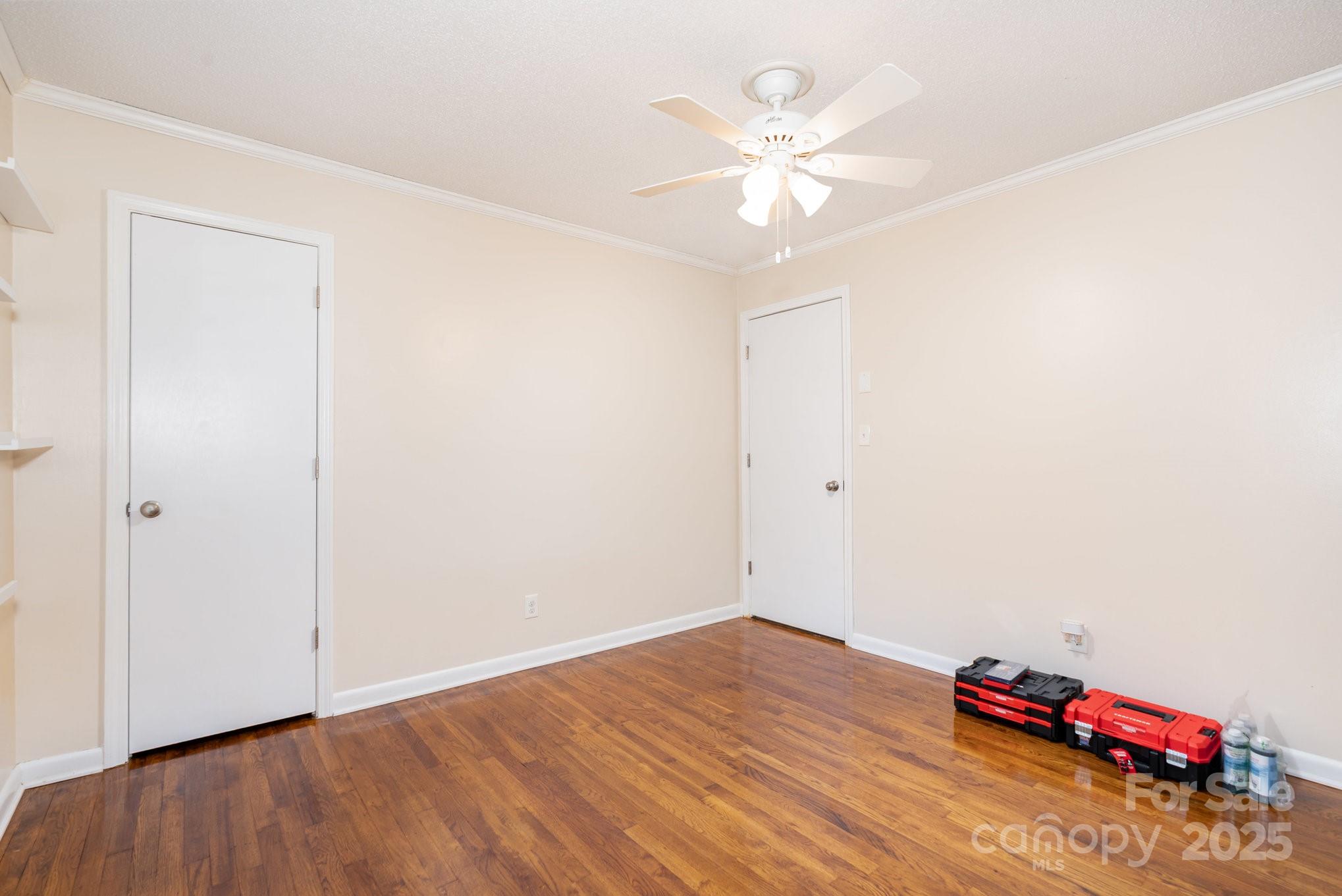 512 Ralphs Boulevard Gastonia, NC 28052 - Photo 23 of 32 a view of room with wooden floor and ceiling fan
