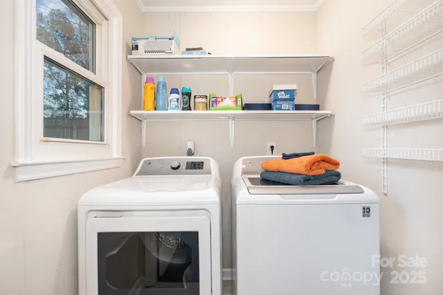 a view of a house with backyard and a sitting area