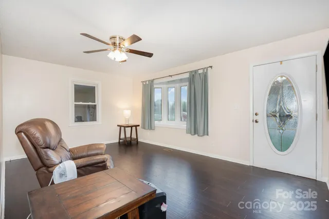 a view of livingroom with furniture and window