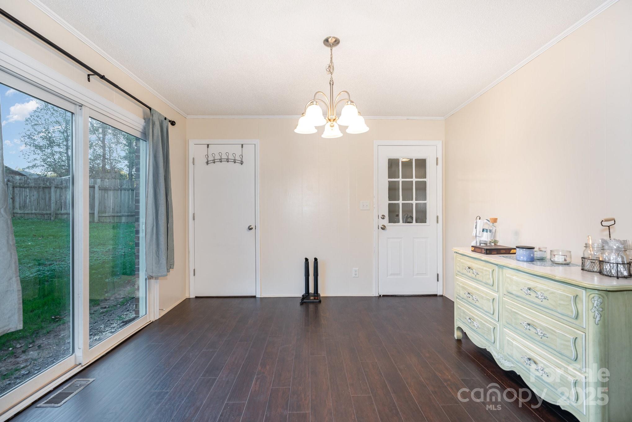 512 Ralphs Boulevard Gastonia, NC 28052 - Photo 10 of 32 a view of a room with wooden floor and windows