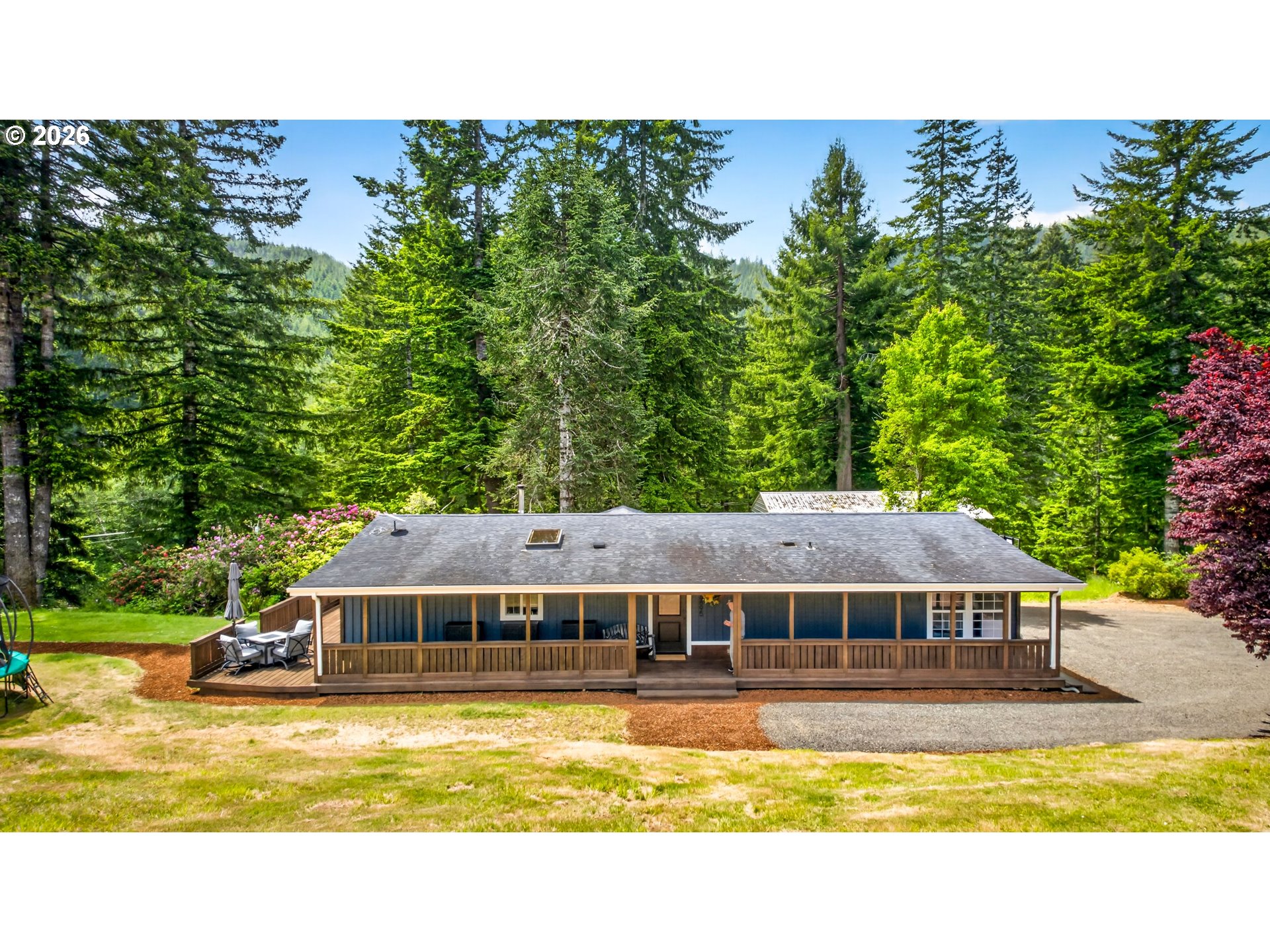 6895 Canary Road Westlake, OR 97493 - Photo 2 of 40 a view of a house with a swimming pool