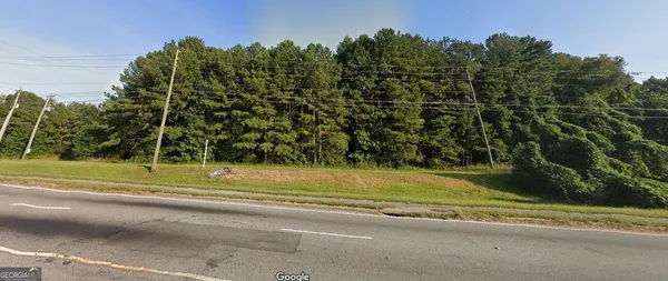 a view of a yard with a trees