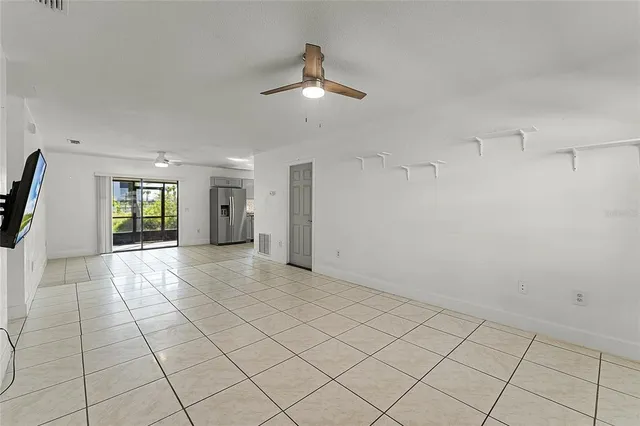 a view of an empty room and window