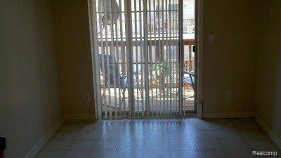 16856 Farmington Road, Unit 64 Livonia, MI 48154 - Photo 8 of 21 B.Nook-Dr Wall 2 Deck.jpg