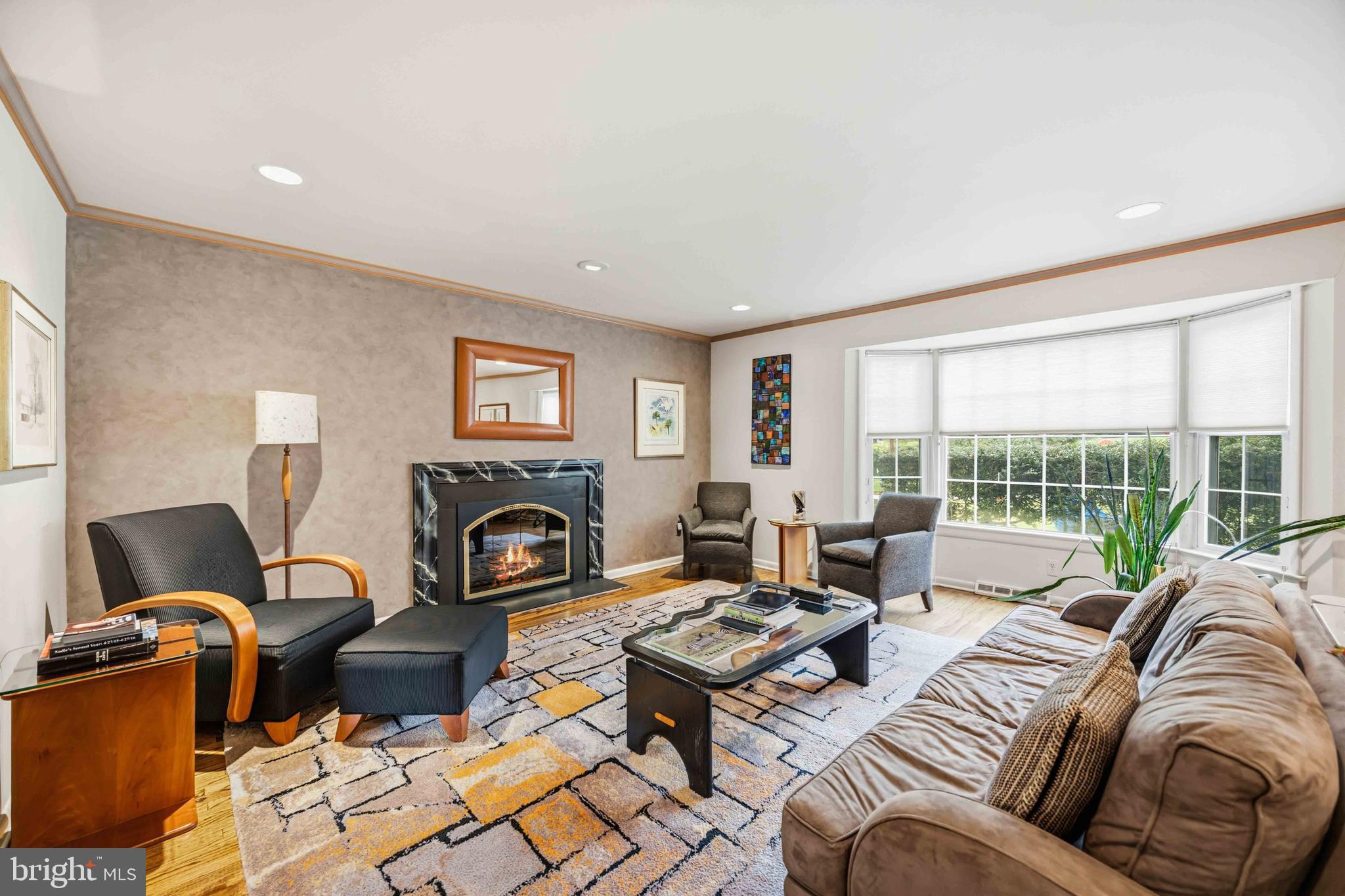 330 Bent Road Wyncote, PA 19095 - Photo 9 of 47 a living room with furniture fireplace and a large window