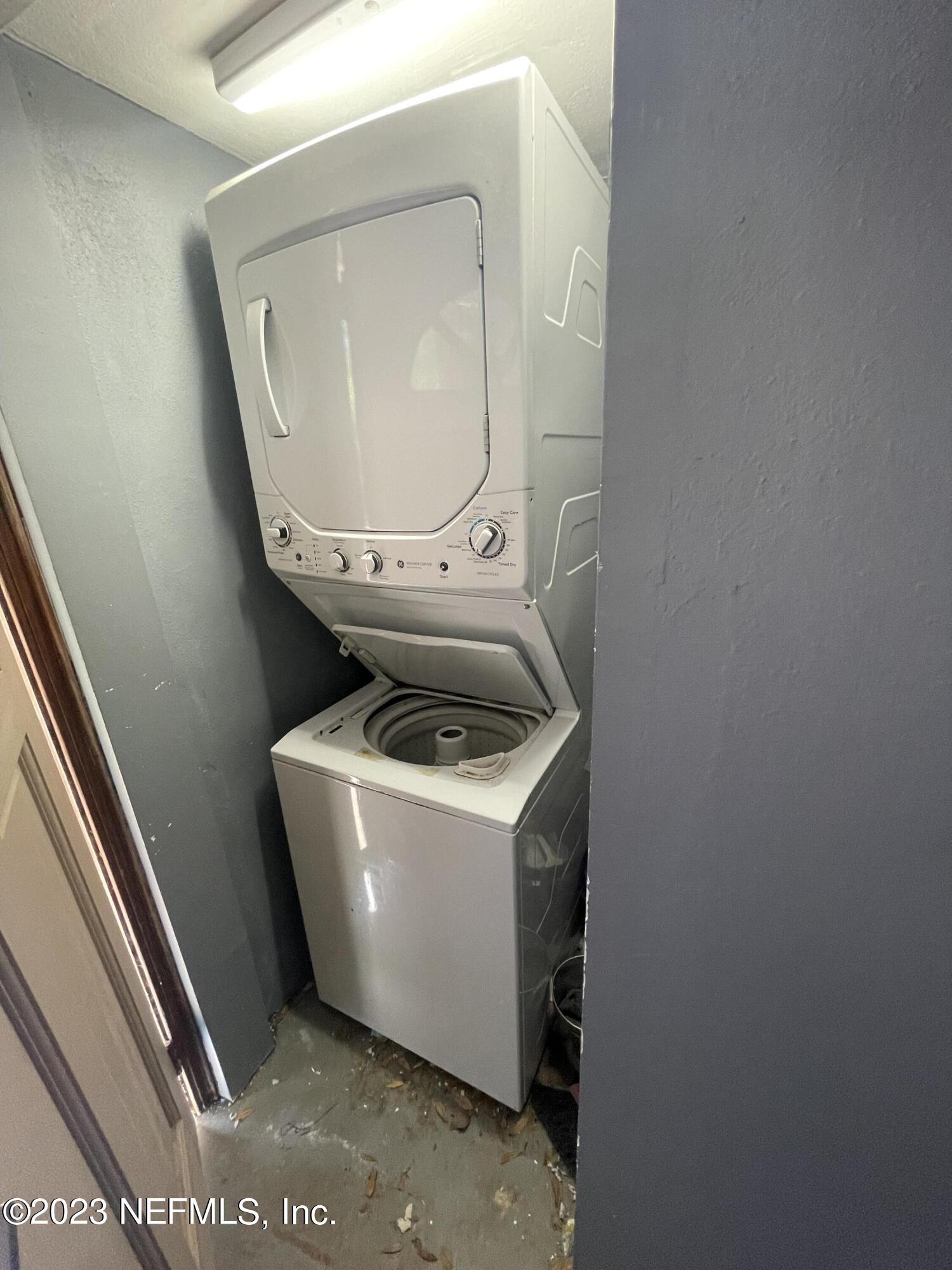 2966 Remington Street, Unit 2 Jacksonville, FL 32205 - Photo 8 of 10 a utility room with dryer and washer