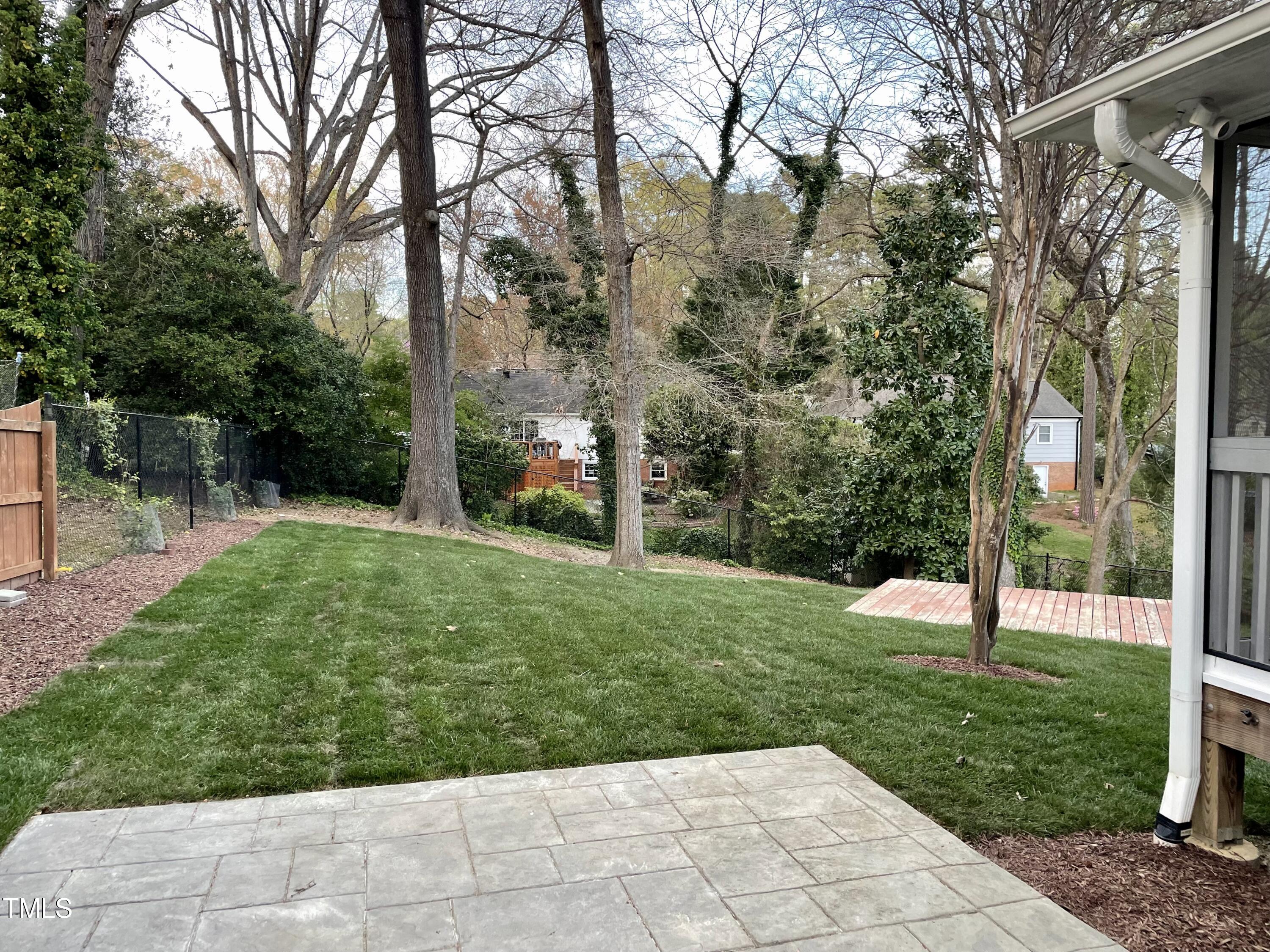 529 Harvard Street Raleigh, NC 27609 - Photo 46 of 48 a view of a garden with a tree