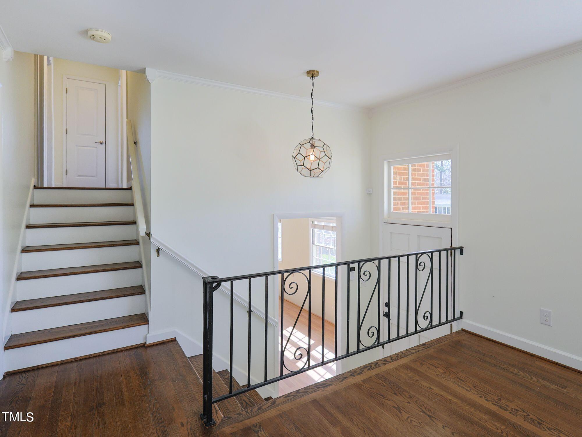 529 Harvard Street Raleigh, NC 27609 - Photo 7 of 48 a view of a hallway with windows