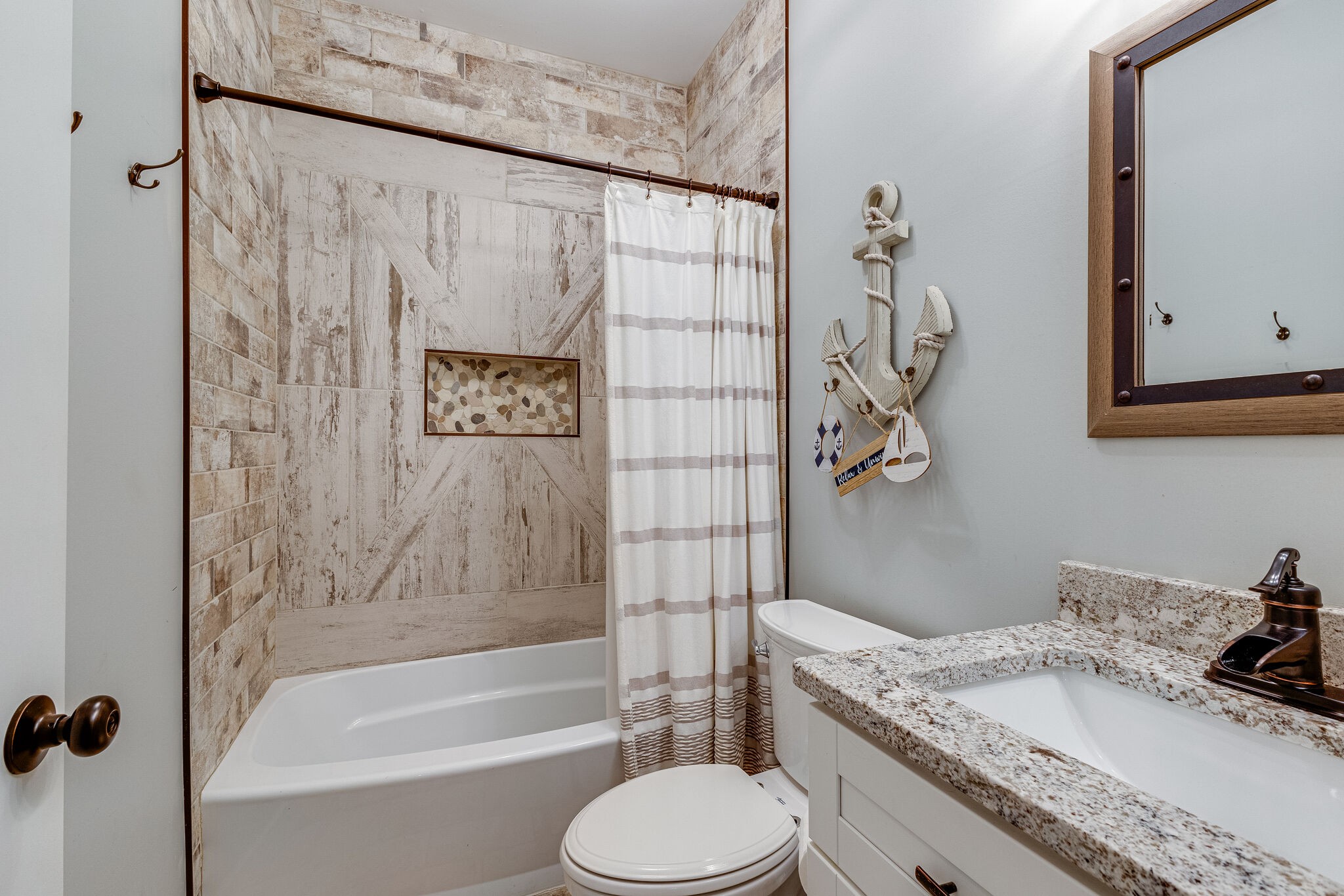 3425 Toms Creek Road Linden, TN 37096 - Photo 13 of 38 a bathroom with a granite countertop sink toilet and shower