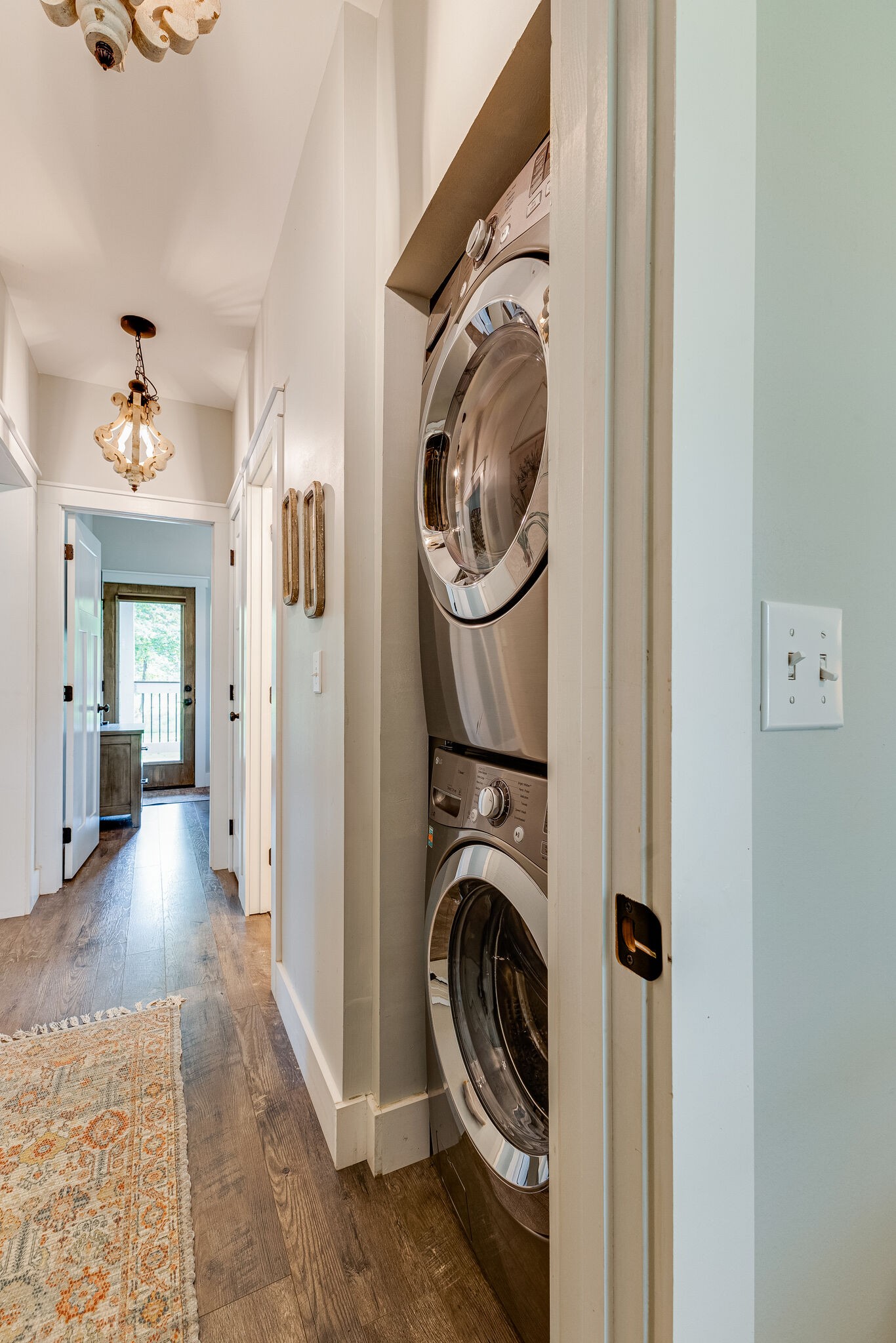 3425 Toms Creek Road Linden, TN 37096 - Photo 17 of 38 a view of a hallway with washer and dryer