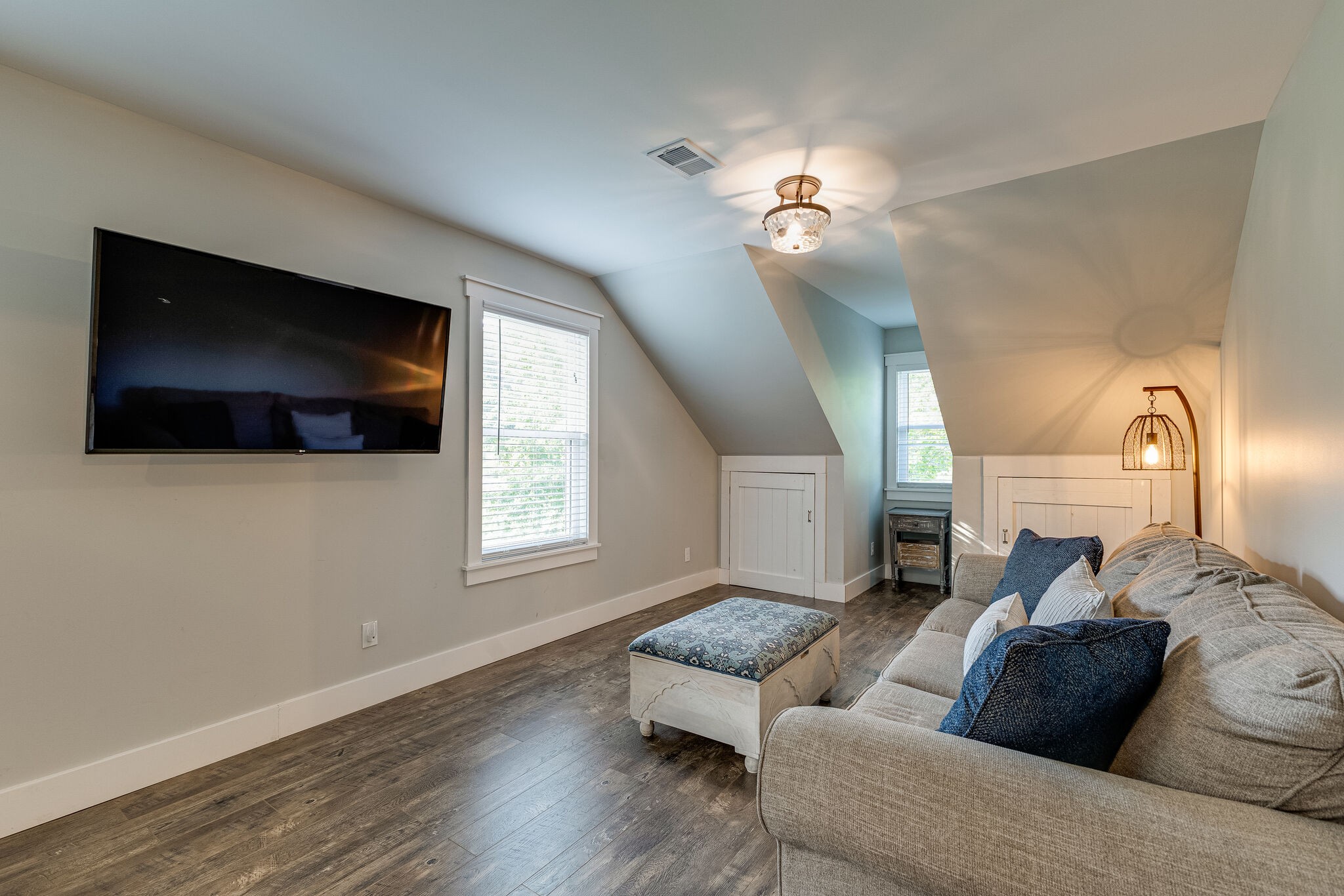 3425 Toms Creek Road Linden, TN 37096 - Photo 25 of 38 a living room with furniture and a flat screen tv