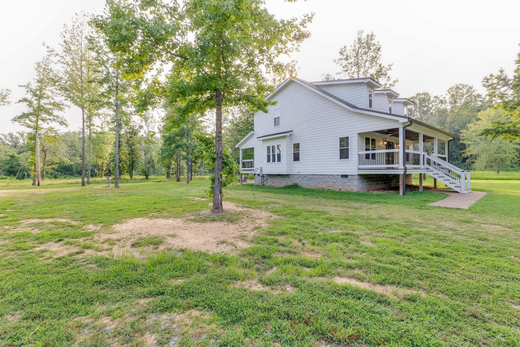 3425 Toms Creek Road Linden, TN 37096 - Photo 31 of 38 a view of a house with a big yard