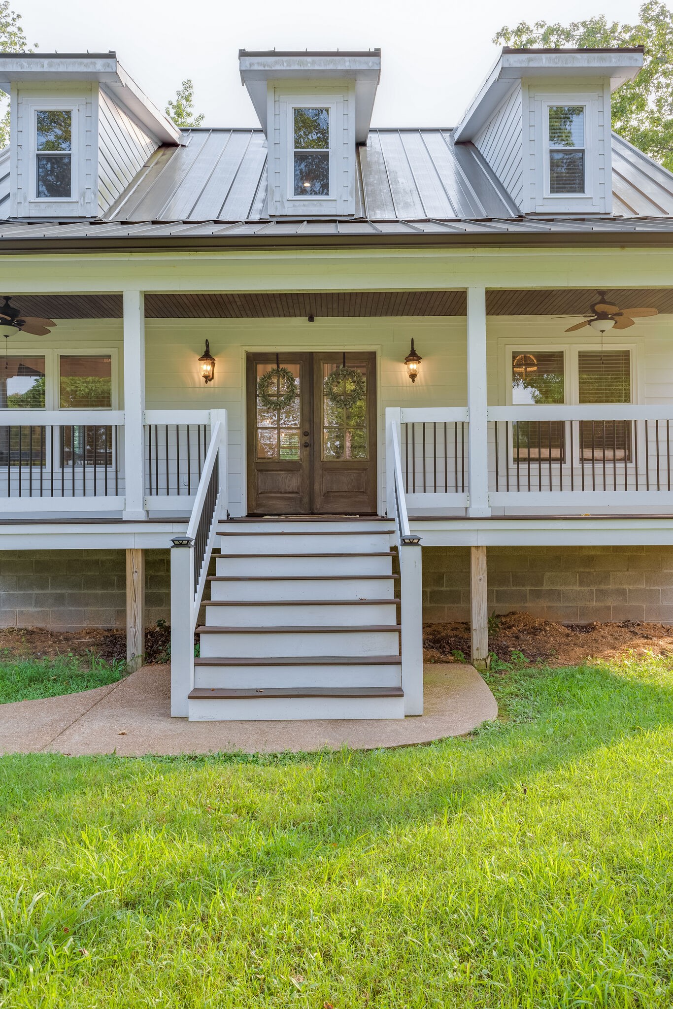 3425 Toms Creek Road Linden, TN 37096 - Photo 4 of 38 a front view of a house with a yard