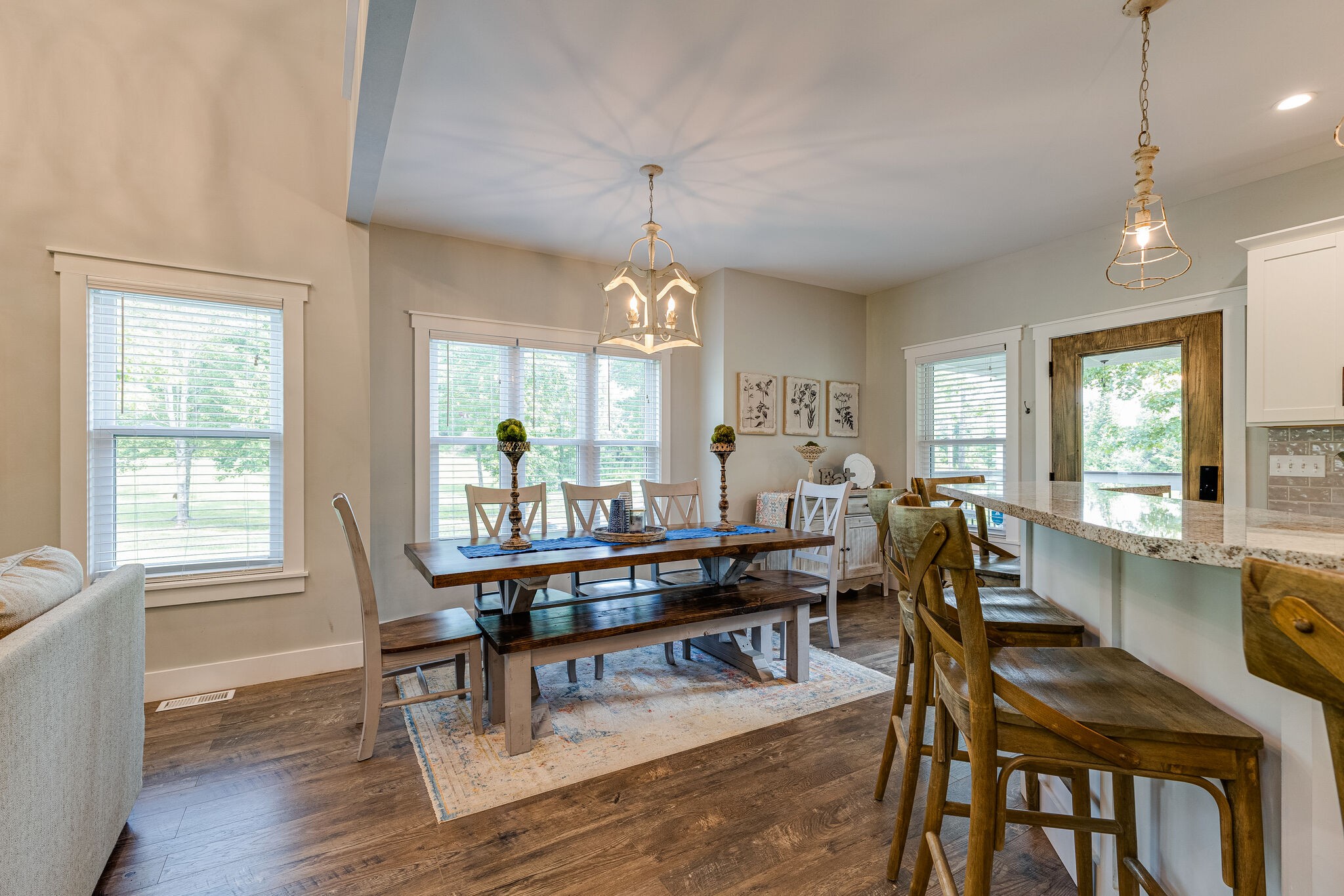 3425 Toms Creek Road Linden, TN 37096 - Photo 9 of 38 a view of a dining room with furniture window and wooden floor