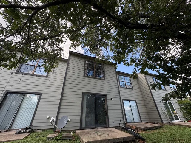 a front view of a house with garage