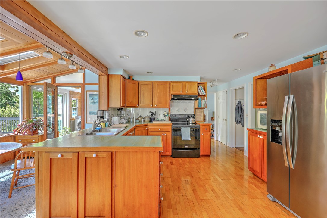80 Touisset Road Warren, RI 02885 - Photo 18 of 48 Kitchen overlooking sunroom