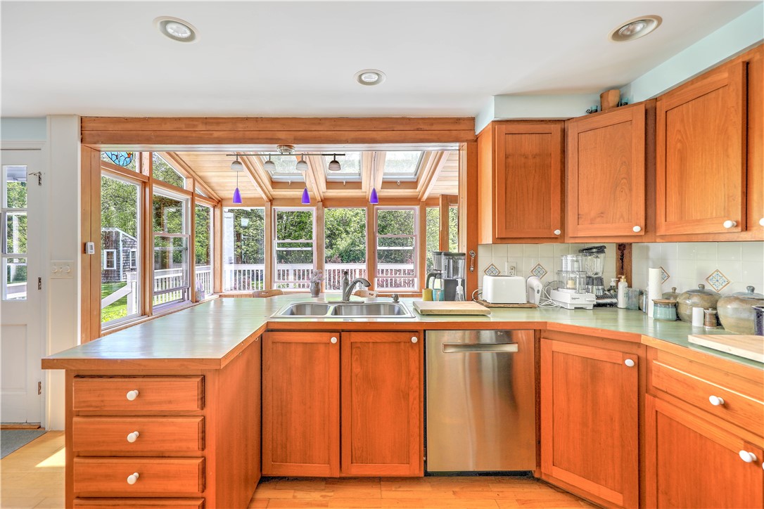 80 Touisset Road Warren, RI 02885 - Photo 19 of 48 Kitchen overlooking sunroom