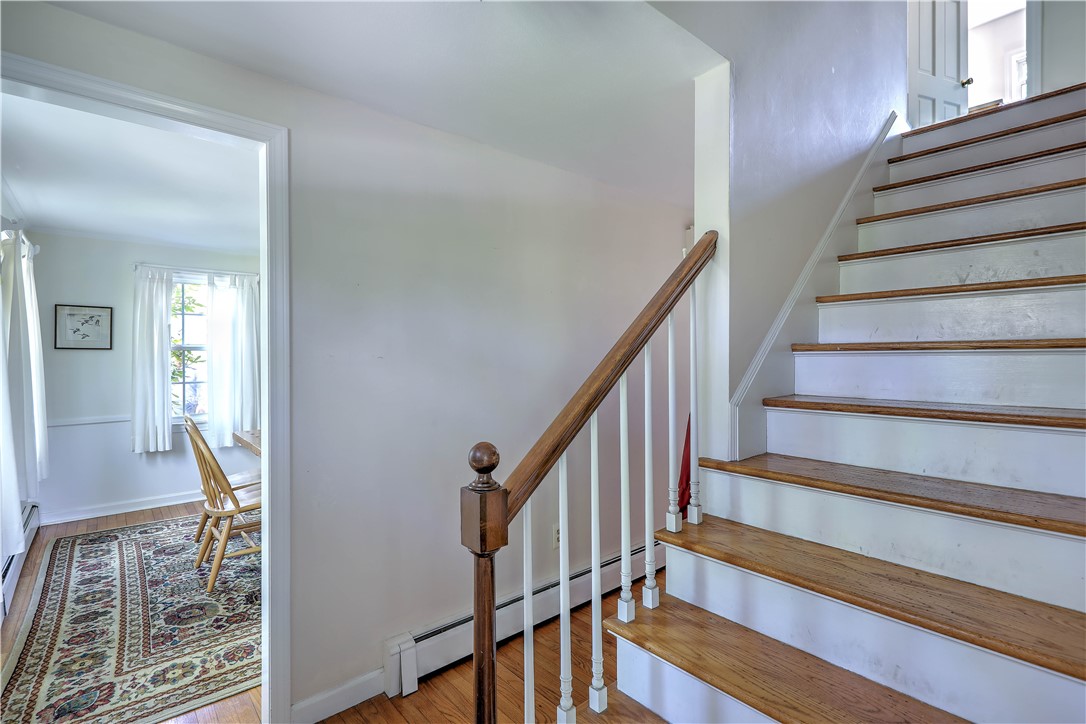 80 Touisset Road Warren, RI 02885 - Photo 28 of 48 Main stairway and front hallway
