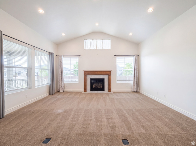 1251 North 2525 West Clinton, UT 84015 - Photo 3 of 30 Spacious living area featuring a vaulted ceiling with recessed lighting