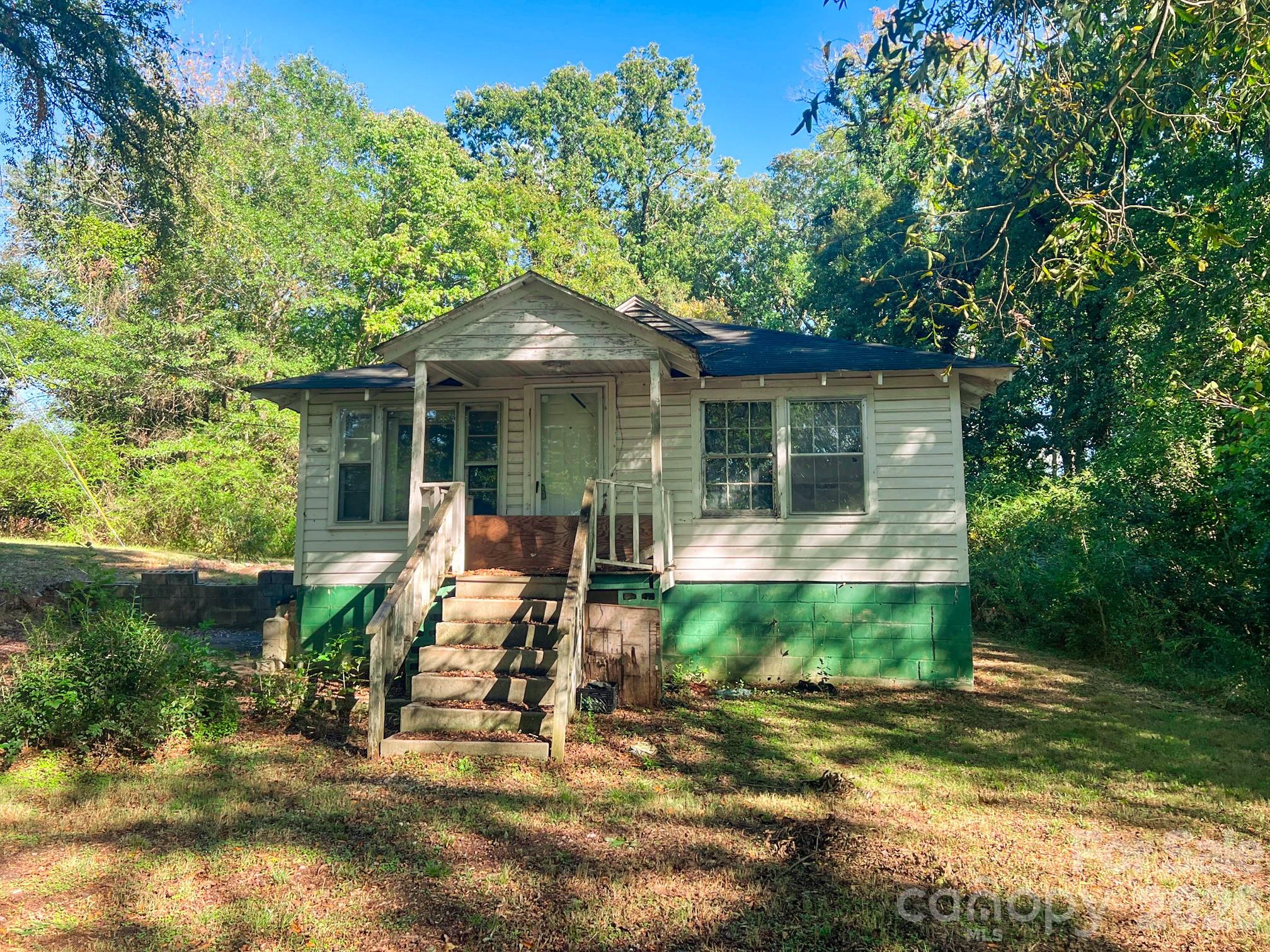 122 Ranson Road Lancaster, SC 29720 - Photo 3 of 19 a view of a house with backyard sitting area and garden