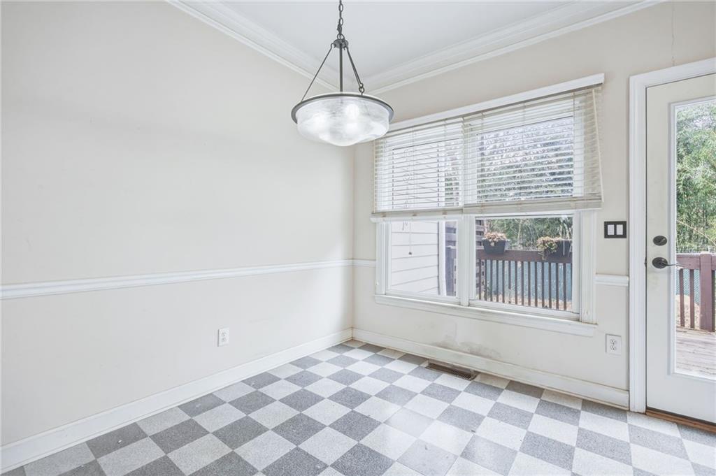 260 Manning Road Southwest, Unit 136 Marietta, GA 30064 - Photo 12 of 43 a view of an empty room with a window