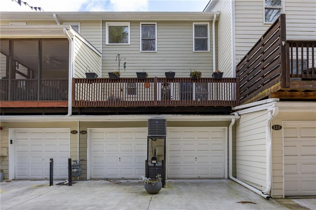 260 Manning Road Southwest, Unit 136 Marietta, GA 30064 - Photo 33 of 43 a view of a house with garage