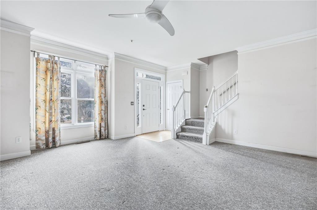 260 Manning Road Southwest, Unit 136 Marietta, GA 30064 - Photo 8 of 43 a view of an empty room with a window