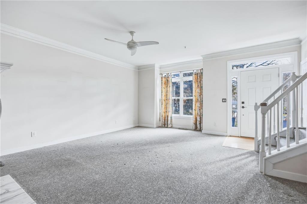 260 Manning Road Southwest, Unit 136 Marietta, GA 30064 - Photo 10 of 43 a view of an empty room with a window