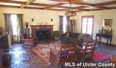 127 Cresent Road Gilboa, NY 12076 - Photo 3 of 5 a living room with furniture a fireplace and a table