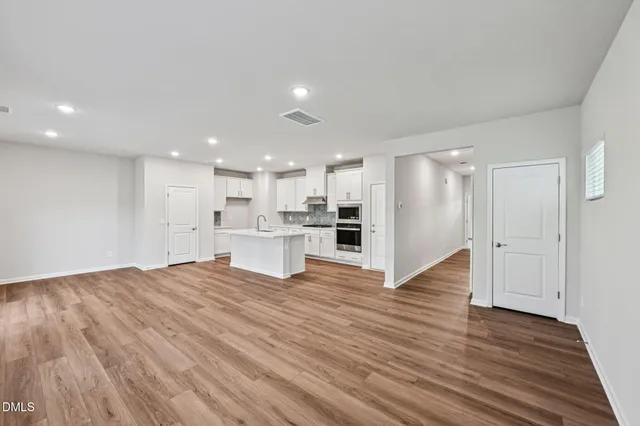 a view of kitchen with wooden floor